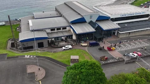 Aerial view of the aftermath of an arson attack at Larne Leisure Centre Co A Stock Footage 311560923