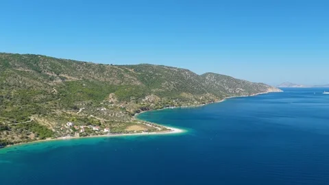 Aerial view of Agios Dimitrios Beach on the island of Alonnisos, Greece, with Stock Footage 346690809