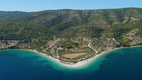 Aerial view of Agios Dimitrios Beach on Alonnisos island, Greece, showcasing a Stock Footage 346692743