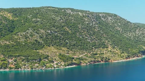 Aerial view of Agios Dimitrios Beach on Alonnisos island, Greece, showing the Stock Footage 346714830