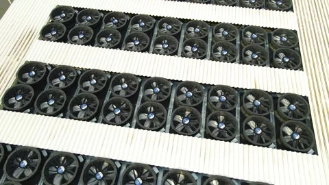 Aerial View of AI Data Center Cooling System Fans Spinning on Rooftop Stock Footage 334363218