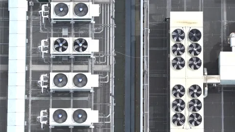 Aerial view of ai data center rooftop cooling units Stock Footage 341110498