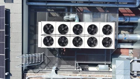 Aerial view of air conditioning system on commercial building rooftop, featuring Video stock 341472604