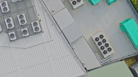 Aerial view of air conditioning units on an industrial rooftop Stock Footage 340595195
