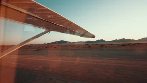 Aerial view from an airplane of dunes in Namibia Africa Stock Footage 299944375