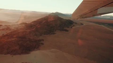 Aerial view from an airplane of dunes in Namibia Africa Stock Footage 299944397