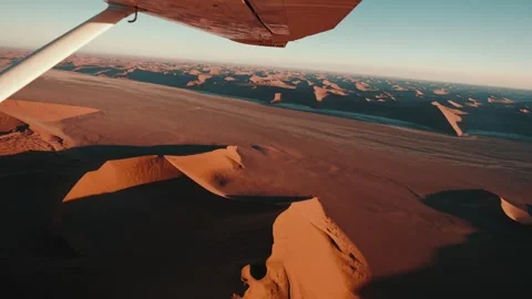 Aerial view from an airplane of dunes in Namibia Africa Stock Footage 299944694