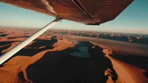 Aerial view from an airplane of dunes in Namibia Africa Stock Footage 299944716