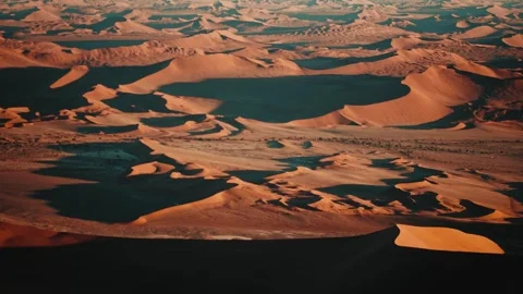 Aerial view from an airplane of dunes in Namibia Africa Stock Footage 299944733