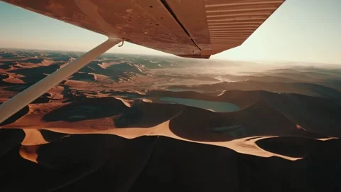 Aerial view from an airplane of dunes in Namibia Africa Stock Footage 299944768