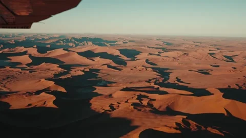 Aerial view from an airplane of dunes in Namibia Africa Stock Footage 299944770