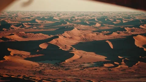 Aerial view from an airplane of dunes in Namibia Africa Stock Footage 299944772