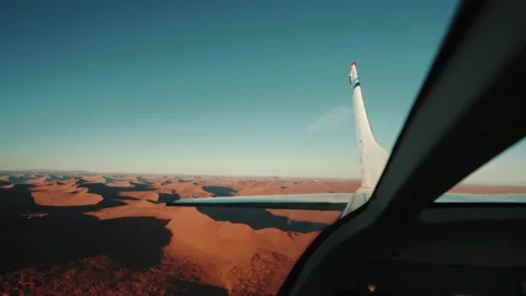 Aerial view from an airplane of dunes in Namibia Africa Stock Footage 299944802