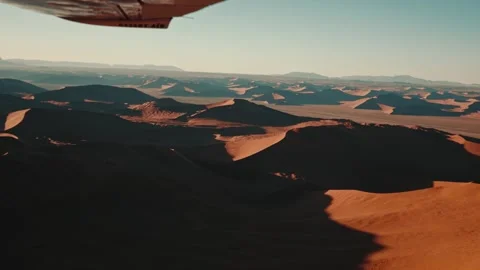 Aerial view from an airplane of dunes in Namibia Africa Stock Footage 299944817