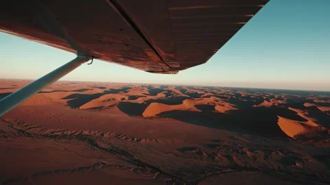 Aerial view from an airplane of dunes in Namibia Africa Stock Footage 299945059
