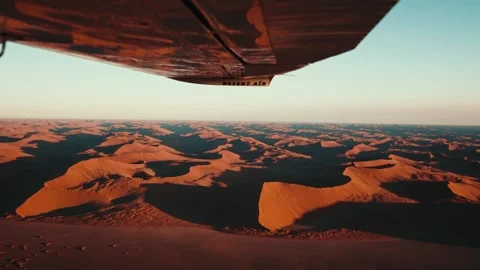 Aerial view from an airplane of dunes in Namibia Africa Stock Footage 299945068