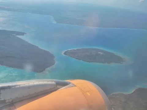 Aerial view of airplane jet engine flying high Stock Photos