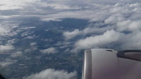 Aerial view from airplane window of cloudscape 库存影片 345944774
