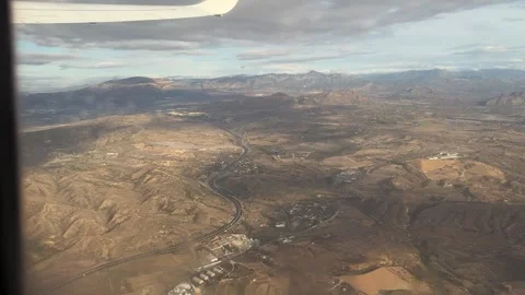 Aerial view from airplane window during takeoff in Alicante, Spain Stock Footage 297373566