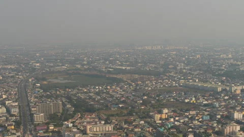 Aerial view from airplane window flying over city Stock Footage 310224328
