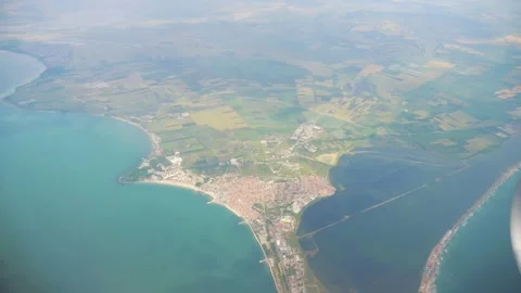 Aerial view from airplane window over Burgas, Bulgarias coastline and green.. Stock Footage 293488937