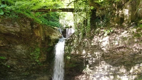 Aerial view of Ajek waterfall in Sochi National Park, Russia Stock Footage 314699214