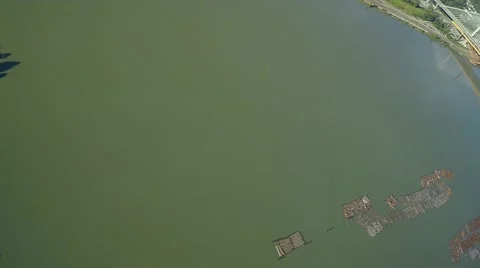 Aerial view of Alex Fraser Bridge and River, BC Canada Stock Footage