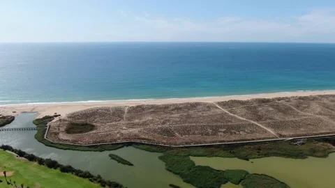 Aerial view of the Algarve Coast, near Armacao de Pera, south of Portugal Stock Footage 153755053