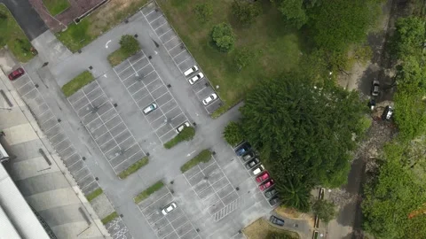 Aerial view of almost empty parking lot in Selangor during MCO Stock Footage 148426599