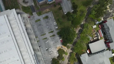 Aerial view of almost empty parking Lot and Building in Selangor Stock Footage 148426610