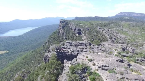 Aerial view along cleff edge and over viewing platform in the Grampians. Stock Footage 119094692