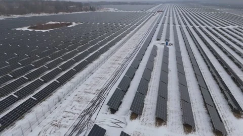 Aerial View Along Rows of a Large Photovoltaic Park in Winter, Germany Stock-Footage 328723808