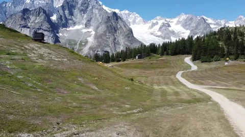 Aerial view - alpine path in front of Mont Blanc Stock Footage 137395110