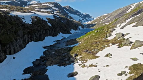 Aerial view of alpine river along the Kjerag hiking trail Norway. Stock Footage 328129193