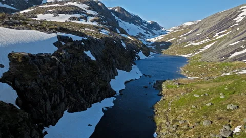 Aerial view of alpine river and rocky valley near Kjerag. Stock Footage 328129231