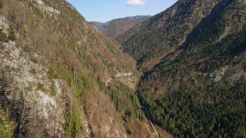 Aerial view of alpine valley and mountains at golden sunset light, Austria Stock-Footage 333207087