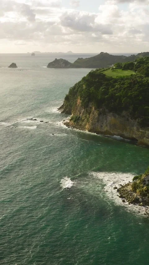 Aerial view of amazing cliffs by the beach in the Coromandel Peninsula on a.. Stock Footage 284738965