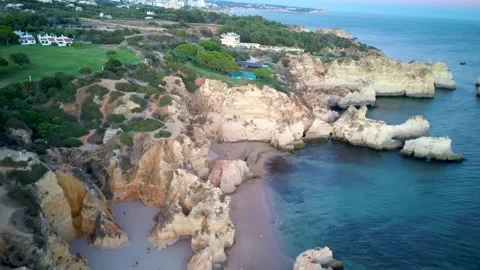 Aerial view of the amazing Praia dos Tres Irmaos in Algarve Stock Footage 147746953