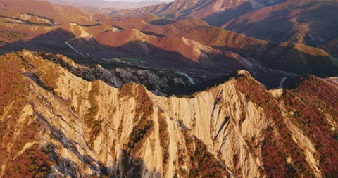 Aerial view of the amazing rocks on sunset, golden hour, cliffs, Canyon, Stock Footage 245362000