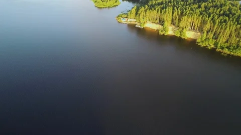 Aerial view. Amazing sky reflected in water. Beautiful sunset over the lake. 스톡 동영상 104670341