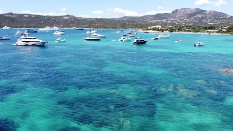 Aerial view of amazing water colors of Sardinia sea Stock Footage