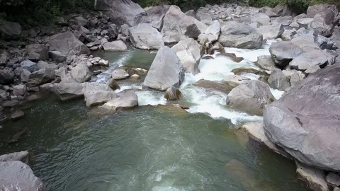 Aerial view of the Amazon jungle river rainforest. Water flowing through rocks. Stock Footage 76161380
