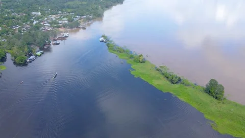 Aerial view of the Amazon River with green banks Stock Footage 330925799