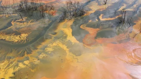 Aerial view of AMD acid mine drainage polluted waters. Natural pattern Stock Footage 346707046