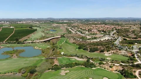 Aerial view of the Amendoeira Golf course, Algarve, Portugal Stock Footage 150914662