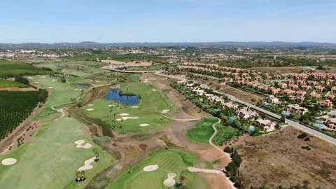 Aerial view of the Amendoeira Golf course, Algarve, Portugal Stock Footage 150944663