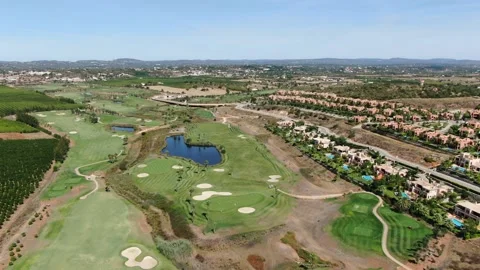 Aerial view of the Amendoeira Golf course, Algarve, Portugal Stock Footage 150951415