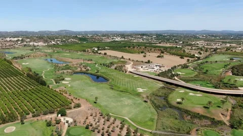 Aerial view of the Amendoeira Golf course, Algarve, Portugal Stock Footage 150987948