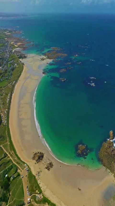 Aerial view of Amiets azure beach in summer with rocks in the region of Brittany 動画素材 319938731