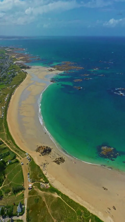 Aerial view of Amiets azure beach in summer with rocks in the region of Brittany Vídeos de archivo 320879610